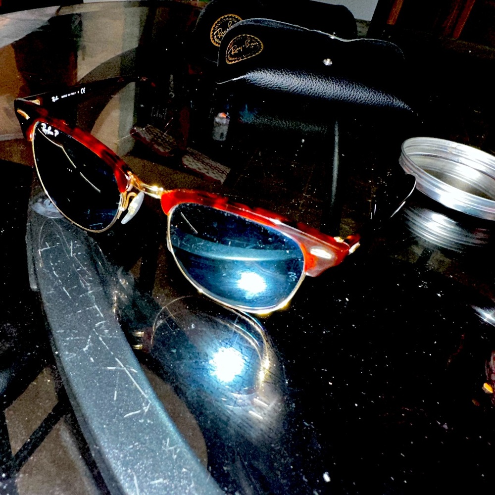 These are a pair of Ray-Ban sunglasses with polarized lenses